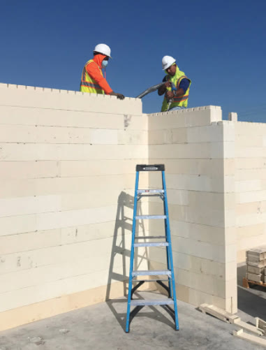 RENCO USA reference photo of workers assembling composite walls